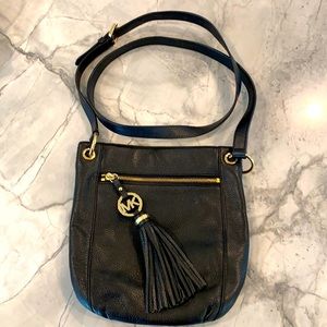 Michael Kors black messenger bag with tassel